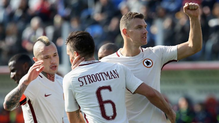 Edin Dzeko celebrates after scoring Roma's second.