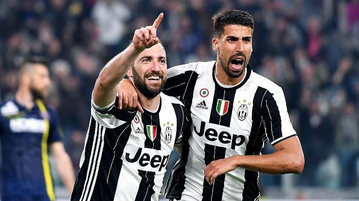 Gonzalo Higuain, left, celebrates with Sami Khedira after his second goal gave Juventus its final 2-0 margin against Chievo Verona.