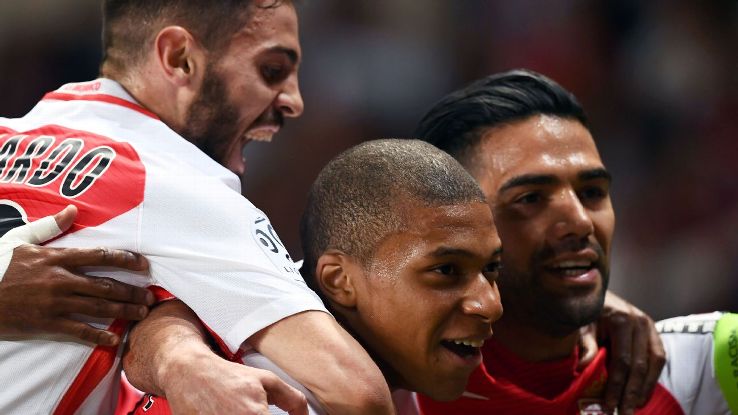 Monaco players celebrate after Kylian Mbappe scored a goal in a win against St Etienne. Monaco players celebrate after Kylian Mbappe scored a goal in a win against St Etienne.