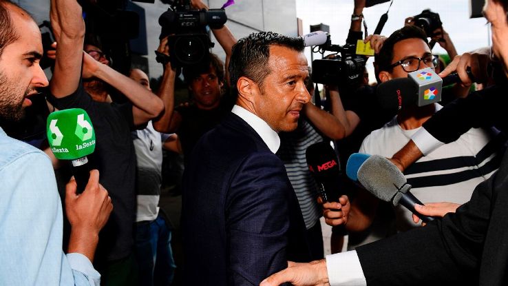 Jorge Mendes, surrounded by journalists, arrives at the Court in Pozuelo de Alarcon on June 27, 2017.