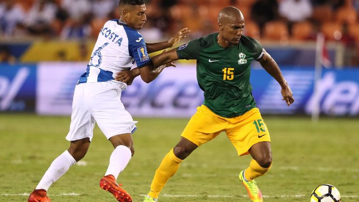 Bryan Acosta, left, and Florent Malouda in action during Honduras' and French Guiana's Gold Cup match on Tuesday.