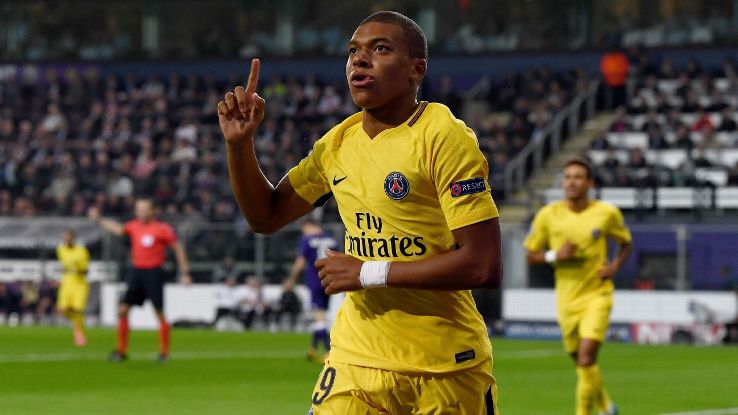 Kylian Mbappe celebrates after opening the scoring for PSG against Anderlecht.