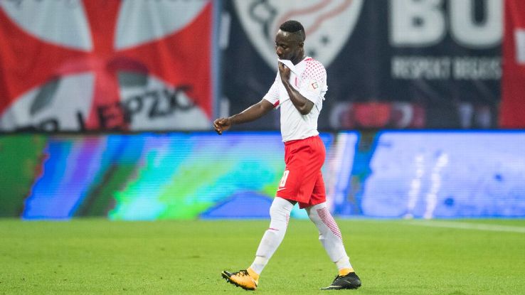 RB Leipzig's Naby Keita walks off after being shown a red card vs. Bayern Munich