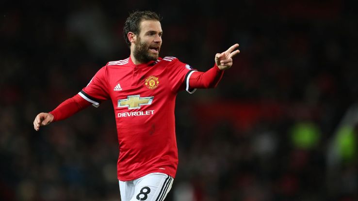 Juan Mata gestures to Man United teammates during a match against Bournemouth.