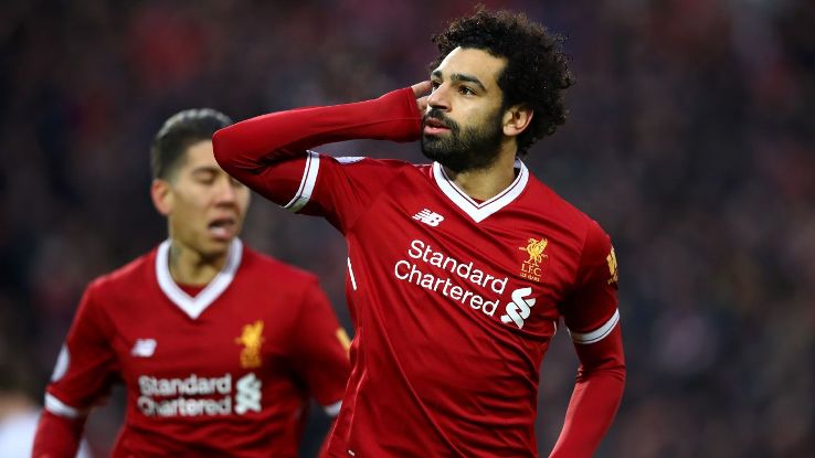 Mohamed Salah celebrates after scoring for Liverpool in their Premier League game against Spurs.