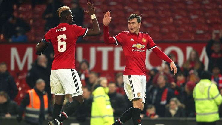 Paul Pogba, left, and Victor Lindelof celebrate during Man United's win against Derby County.