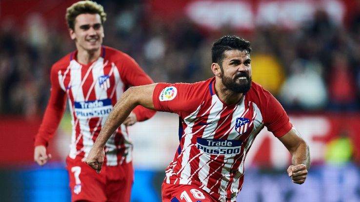 Diego Costa celebrates after scoring a goal for Atletico Madrid against Sevilla.