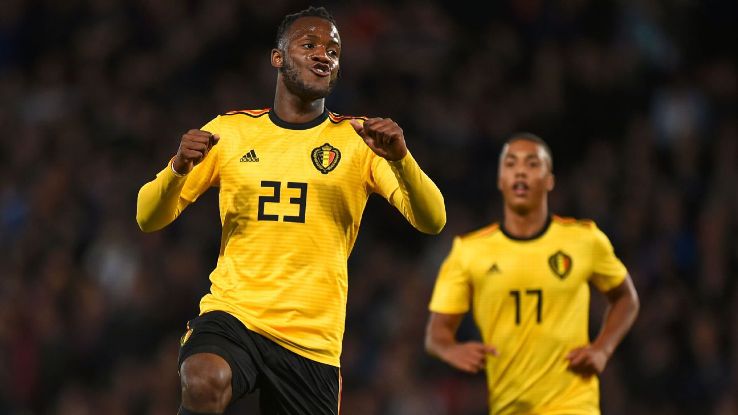 Michy Batshuayi celebrates one of his two goals against Scotland.