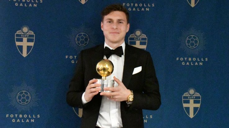 Victor Lindelof  poses with Sweden's Golden Ball.
