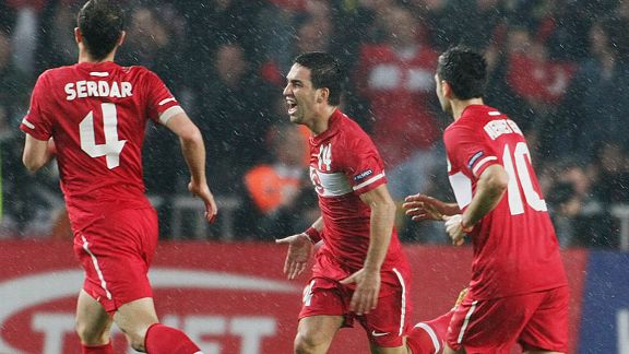 Turkey celebrate after Arda Turan (c) put them in front at home to Austria