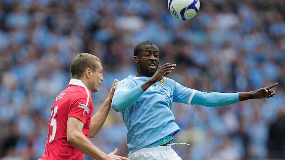 Nemanja Vidic and Yaya Toure