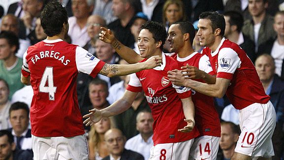 Theo Walcott celebrates his goal with his team-mates
