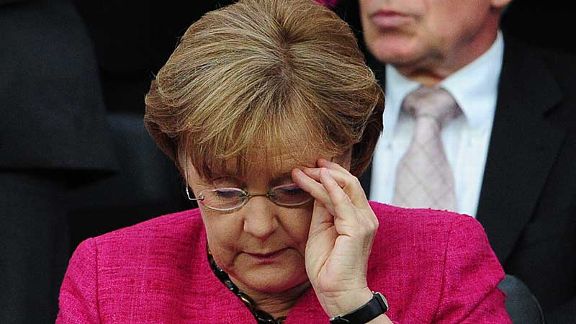 Birthday girl: German chancellor Angela Merkel gets her glasses on
