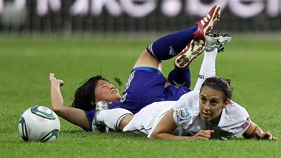 Floored in Frankfurt: Shinobu Ohno and Carli Lloyd hit the deck