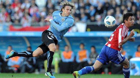 Diego Forlan fires home to put Uruguay into a 2-0 lead