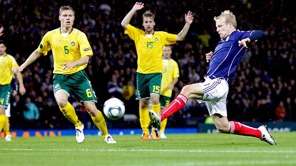 Scotland's Steven Naismith scores the winning goal against Lithuania