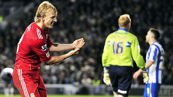 Dirk Kuyt celebrates after firing Liverpool's crucial second