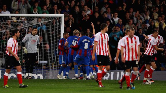 Crystal Palace celebrate after Jermaine Easter's late penalty rounded off the victory