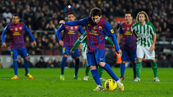 Lionel Messi scores Barcelona's fourth goal from the penalty spot