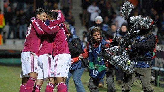 Lyon celebrate after Alexandre Lacazette's goal put them ahead against APOEL Nicosia