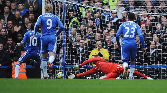 Colin Doyle of Birmingham City saves a penalty from Juan Mata of Chelsea