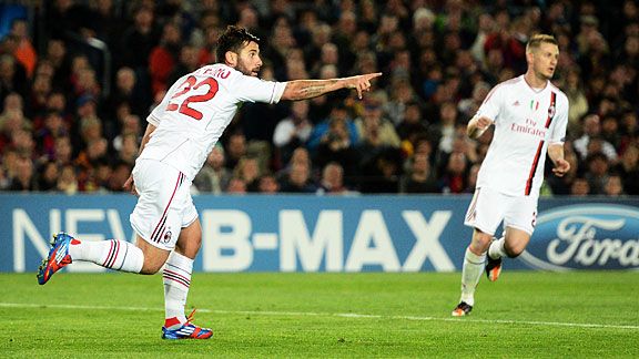Antonio Nocerino celebrates after he brought Milan back on level terms at Camp Nou.