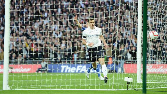 Gareth Bale fires the ball into the empty net to give Spurs hope