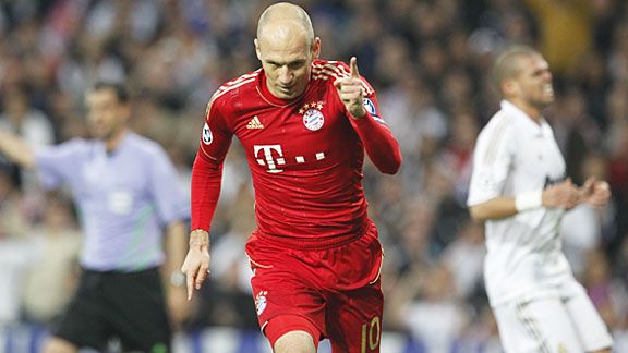 Arjen Robben celebrate after scoring a vital penalty for Bayern at the Bernabeu, making it 3-3 on aggregate.