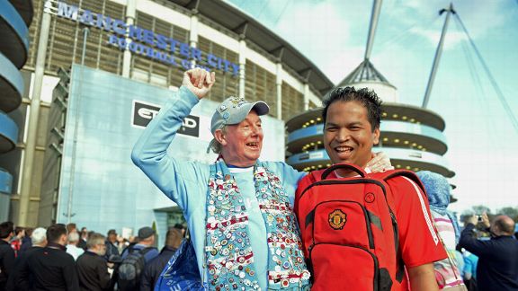 Manchester City and Manchester United fans enjoy the build-up to the derby