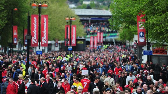 Fans make their way up Wembley Way ahead of the match
