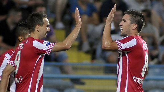Tim Matavz and Kevin Strootman celebrate during PSV's 5-0 over Zeta