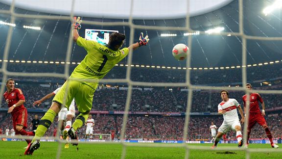 Bastian Schweinsteiger heads in Bayern Munich's six goal
