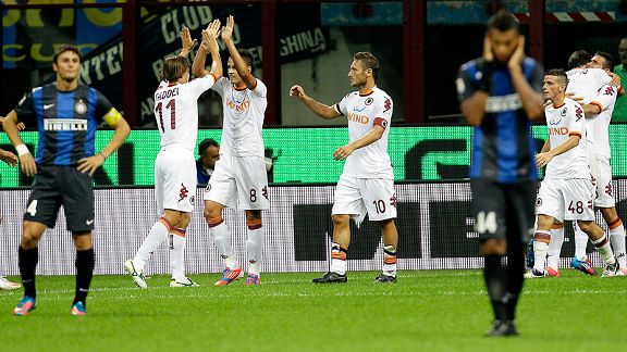 Roma celebrate Marquinho's goal against Inter Milan