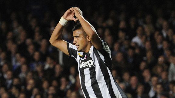 Arturo Vidal celebrates after pulling a goal back for Juventus at Chelsea