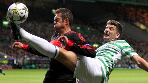 Celtic's Charlie Mulgrew challenges Benfica's Vieira Jardel