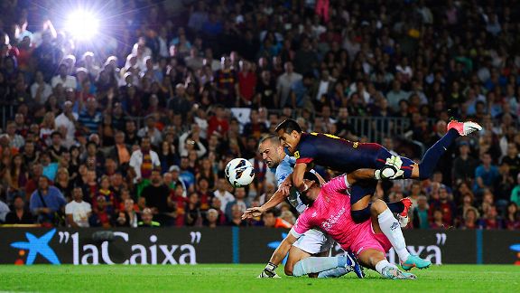 Barca's Alexis Sanchez is brought down by Tono Martinez and Borja Gomez
