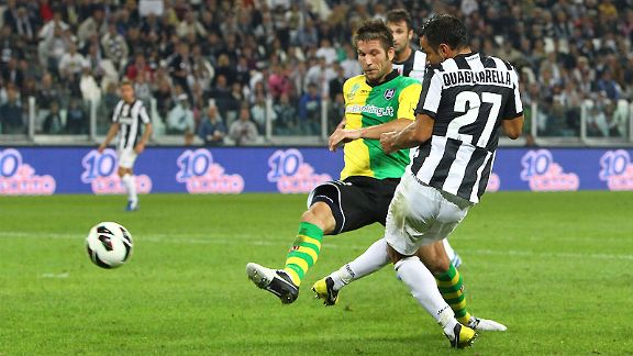Fabio Quagliarella scores his and Juventus' second goal of the game against Chievo