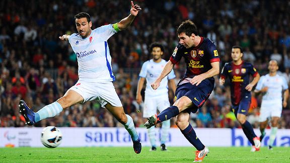 Lionel Messi's shot was deflected into his own goal by Granada's Borja Gomez