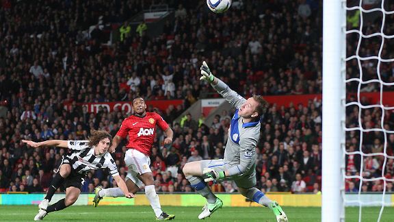 Newcastle goalkeeper Rob Elliot saves Anderson's shot