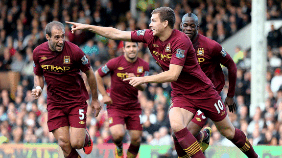 Edin Dzeko celebrates