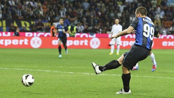 Antonio Cassano scores from the spot