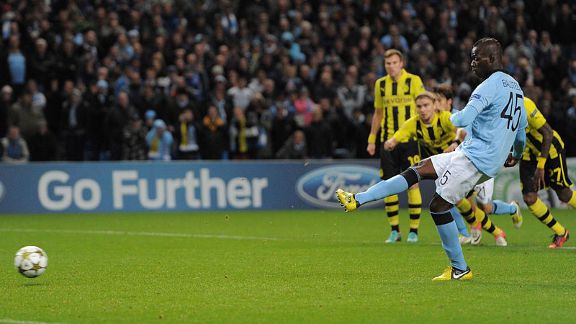 Mario Balotelli scores from the penalty spot against Borussia Dortmund