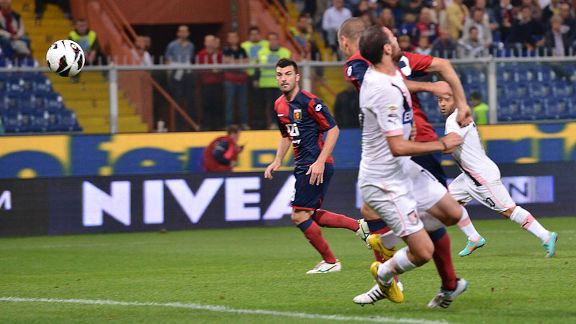 Luigi Giorgi of Palermo scores the opening goal in the 1-1 draw with Genoa
