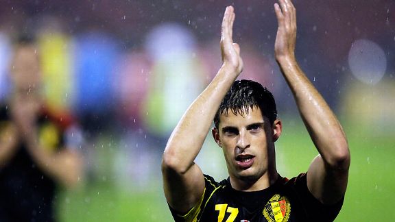 Kevin Mirallas salutes the travelling Belgium fans after his side's victory over Serbia in Belgrade