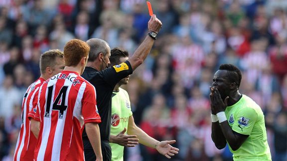 Chiek Tiote is shown the red card for Newcastle in the Wear-Tyne derby