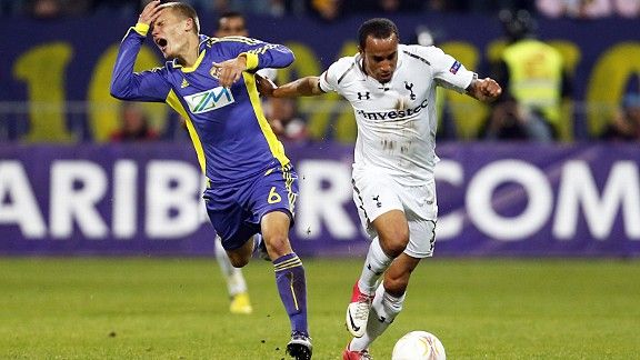 Martin Milec claims he is caught by a stray arm from Andros Townsend 