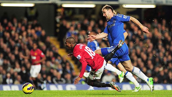 Ashley Young is tripped by Branislav Ivanovic when through on goal, leading to the Chelsea player's red card
