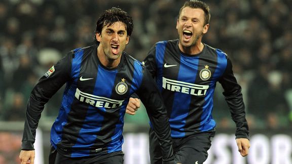 Diego Milito celebrates his second goal for Inter at Juventus