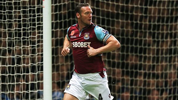 Kevin Nolan turns towards the referee after the whistle goes to rule out his early 