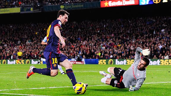 Celta Vigo goalkeeper Javi Varas makes himself big to thwart Lionel Messi
